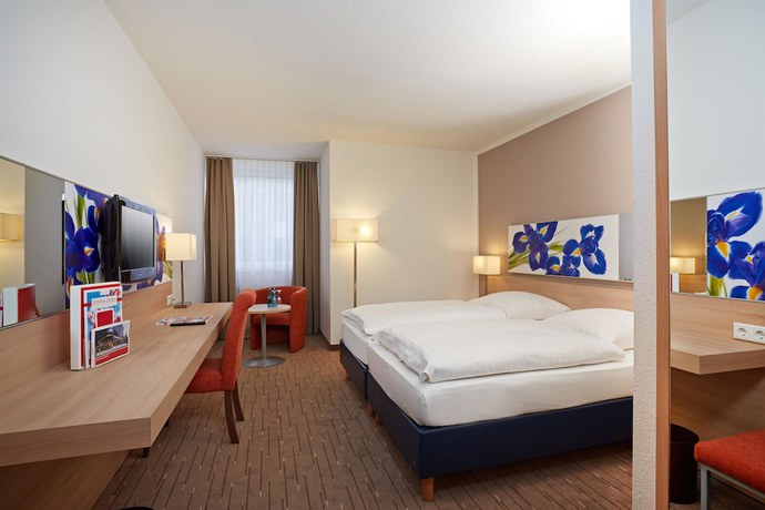 Imagen de la habitación del Hotel H+ Hotel Wiesbaden Niedernhausen. Foto 1