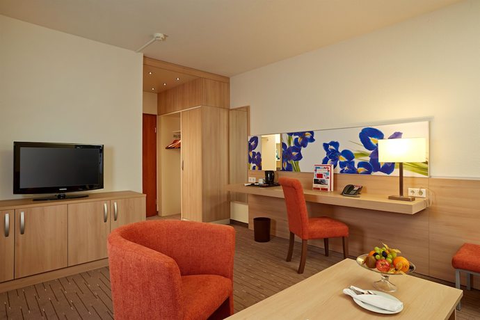 Imagen de la habitación del Hotel H+ Hotel Wiesbaden Niedernhausen. Foto 11