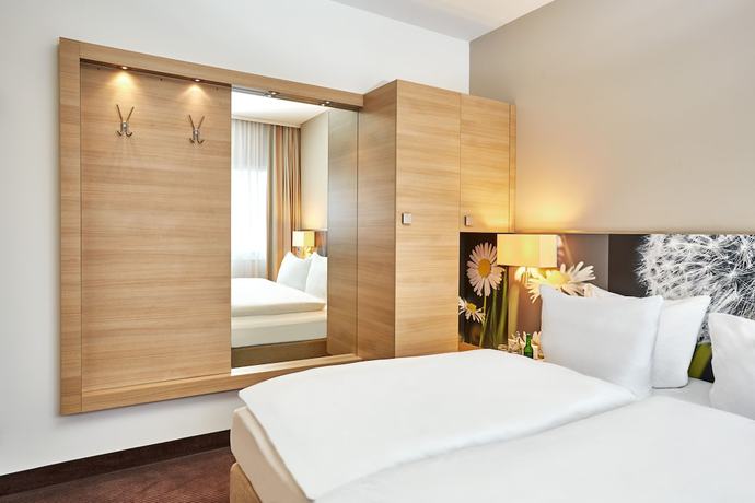 Imagen de la habitación del Hotel H+ Hotel Zurich. Foto 4