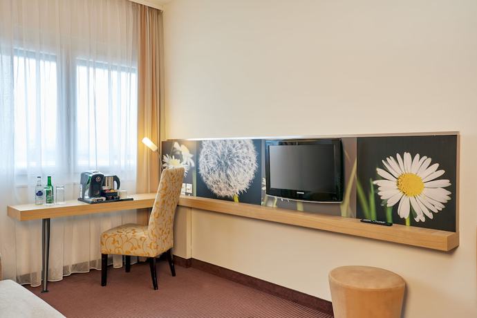 Imagen de la habitación del Hotel H+ Hotel Zurich. Foto 5