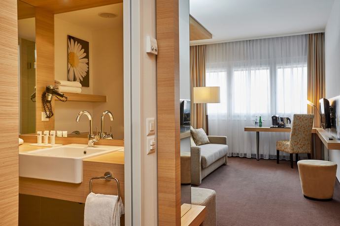 Imagen de la habitación del Hotel H+ Hotel Zurich. Foto 13