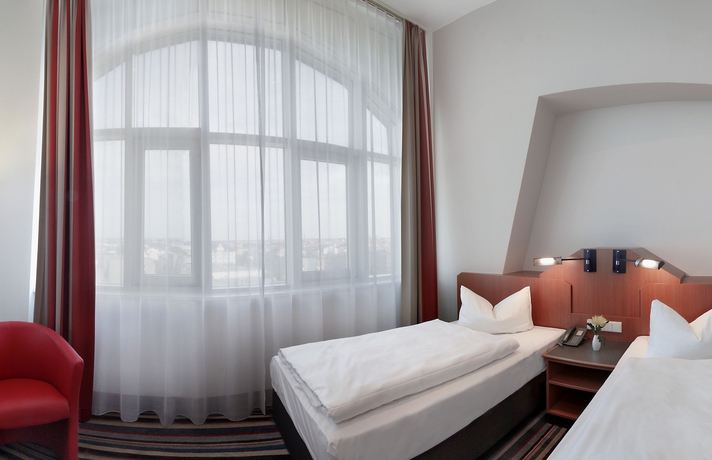 Imagen de la habitación del Hotel H+ Leipzig. Foto 6