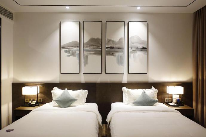 Imagen de la habitación del Hotel H Life Qianhai Branch. Foto 4