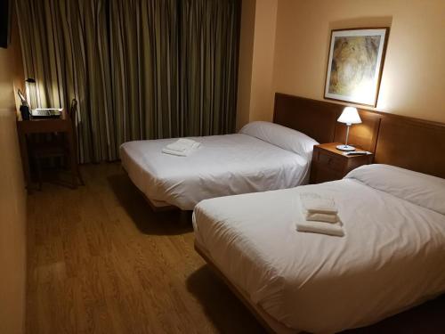 Imagen de la habitación del Hotel H. O Lar. Foto 11