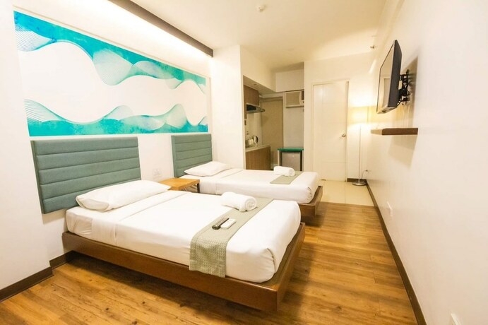 Imagen de la habitación del Hotel H Quezon City. Foto 14