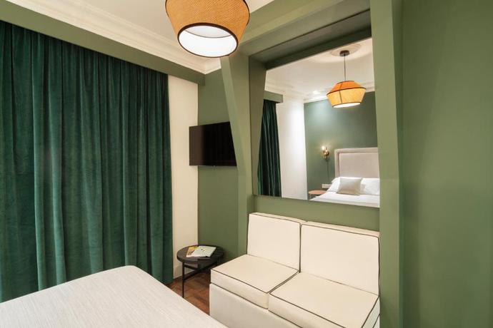Imagen de la habitación del Hotel H Regas. Foto 6