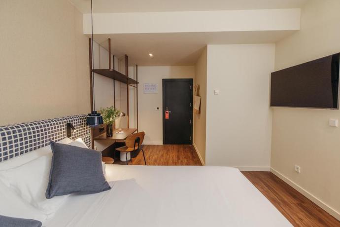 Imagen de la habitación del Hotel H Regas. Foto 11