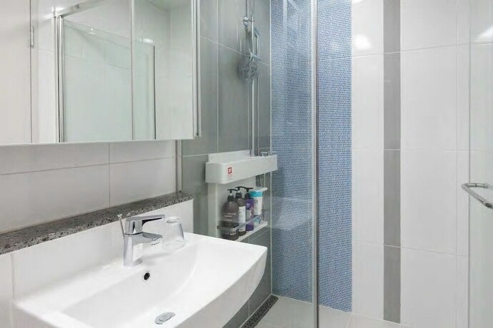 Imagen de la habitación del Hotel H Stay. Foto 13
