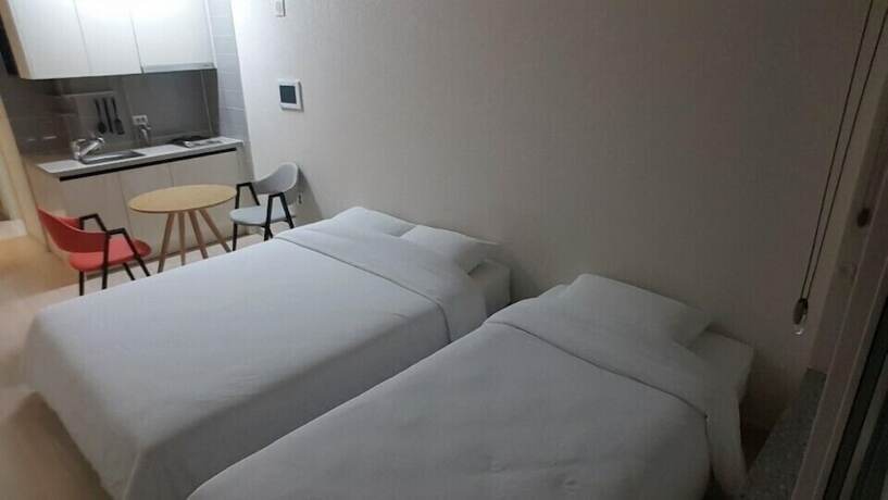 Imagen de la habitación del Hotel H Stay. Foto 17