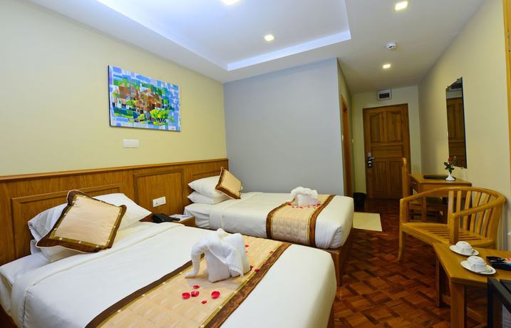 Imagen de la habitación del Hotel H Valley Yangon. Foto 3