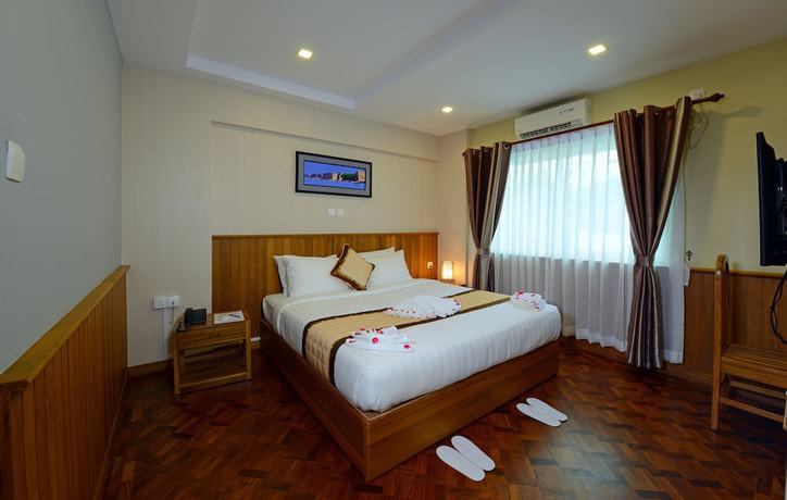 Imagen de la habitación del Hotel H Valley Yangon. Foto 5