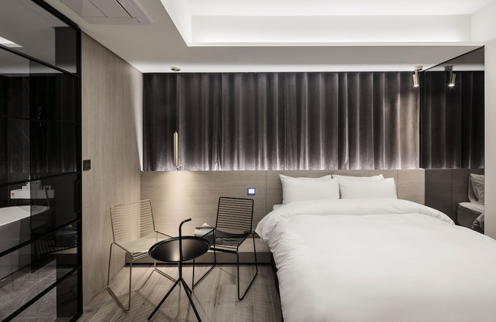 Imagen de la habitación del Hotel H Wangsimni. Foto 17