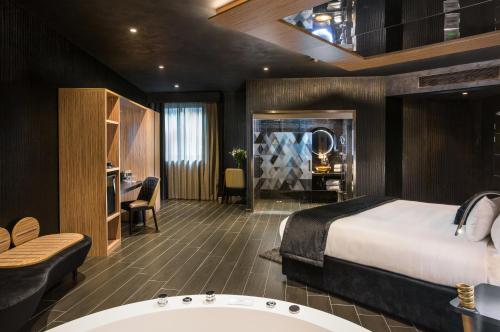 Imagen de la habitación del Hotel H & Spa Adults Only. Foto 8