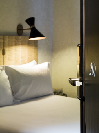 Imagen de la habitación del Hotel H10 Catalunya Plaza Boutique. Foto 12