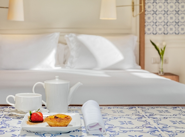 Imagen de la habitación del Hotel H10 Duque De Loulé. Foto 9