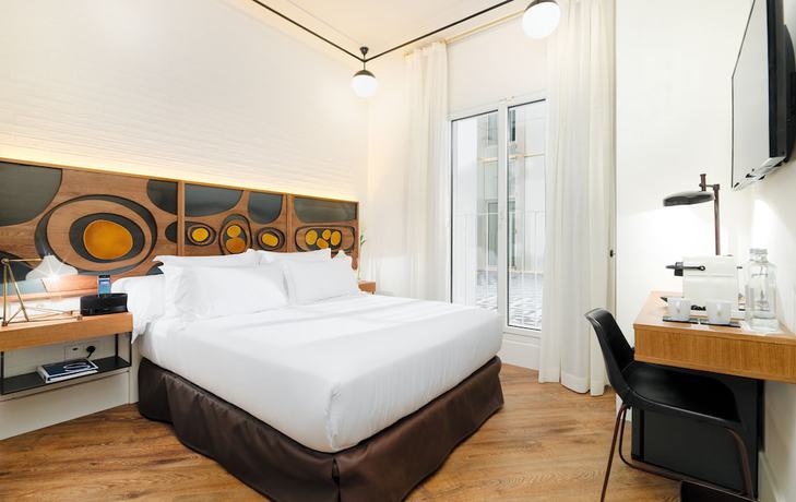 Imagen de la habitación del Hotel H10 Metropolitan. Foto 14