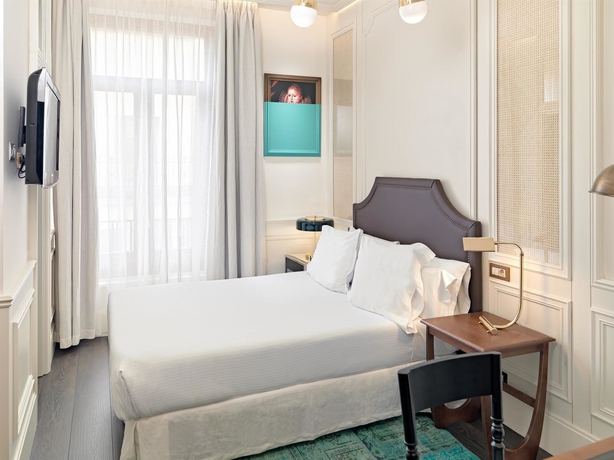 Imagen de la habitación del Hotel H10 Villa De La Reina Boutique. Foto 9