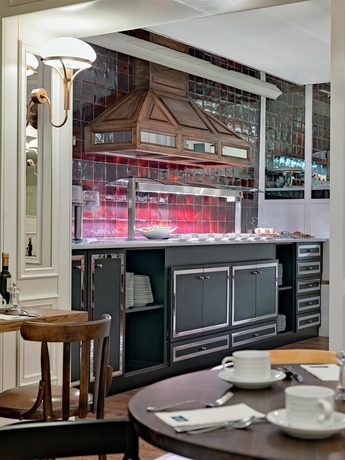 Imagen del bar/restaurante del Hotel H10 Villa De La Reina Boutique. Foto 7