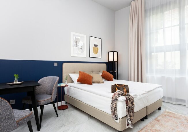 Imagen de la habitación del Hotel H11 Aparthotel. Foto 14