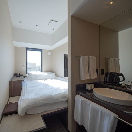Imagen de la habitación del Hotel H2 Nagasaki. Foto 11