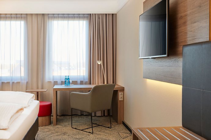 Imagen de la habitación del Hotel H4 Hotel Hannover Messe. Foto 8