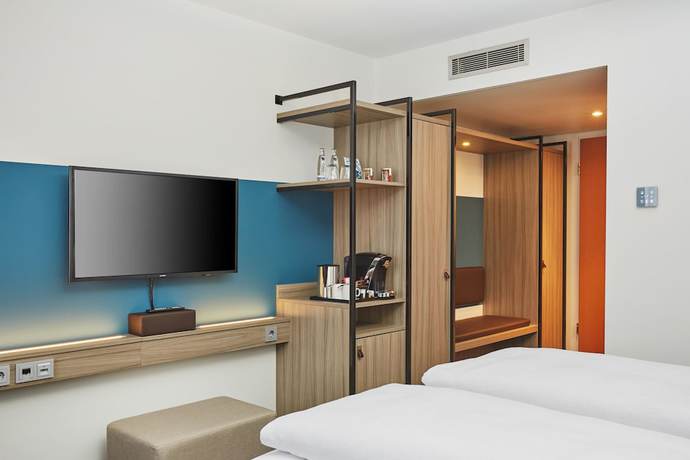 Imagen de la habitación del Hotel H4 Hotel Leipzig. Foto 12