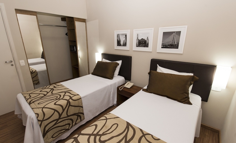 Imagen de la habitación del Hotel H4 Opera Jardins. Foto 8