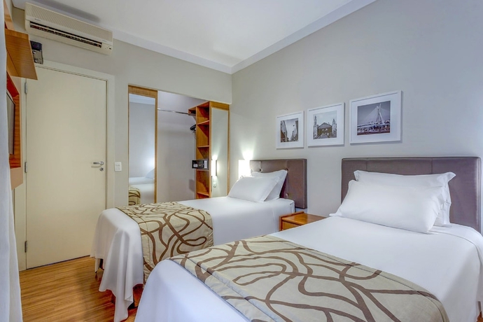 Imagen de la habitación del Hotel H4 Opera Jardins. Foto 10