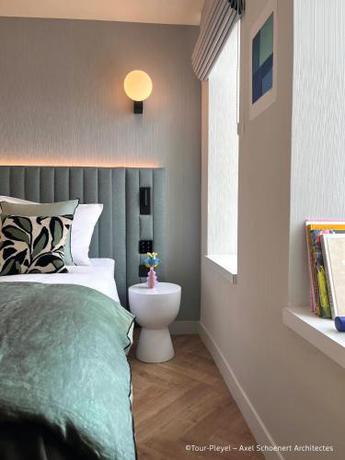 Imagen de la habitación del Hotel H4 Wyndham Paris Pleyel Resort. Foto 16