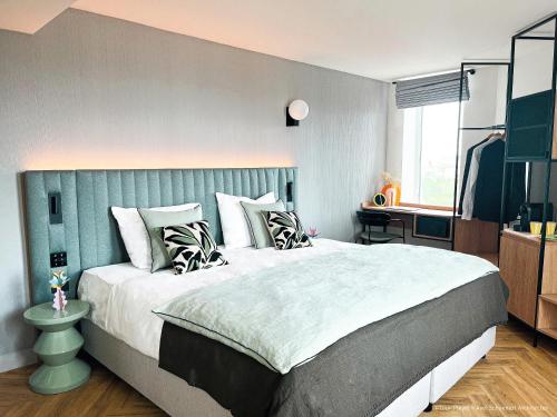 Imagen de la habitación del Hotel H4 Wyndham Paris Pleyel Resort. Foto 18