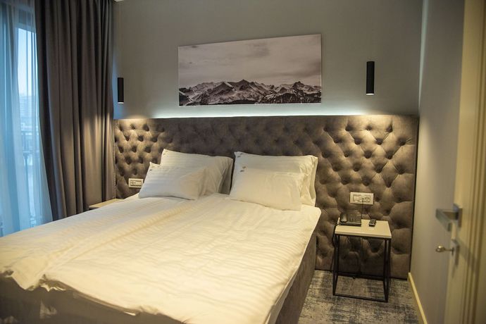 Imagen de la habitación del Hotel H41 Luxury Suites. Foto 7