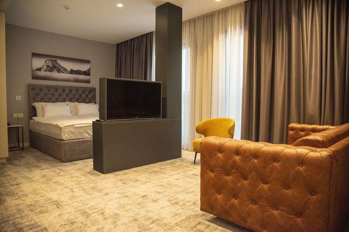 Imagen de la habitación del Hotel H41 Luxury Suites. Foto 8