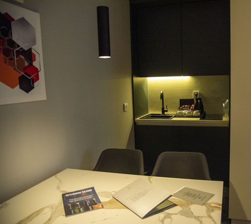 Imagen de la habitación del Hotel H41 Luxury Suites. Foto 11