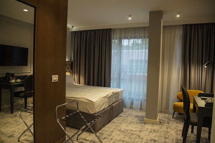 Imagen de la habitación del Hotel H41 Luxury Suites. Foto 15