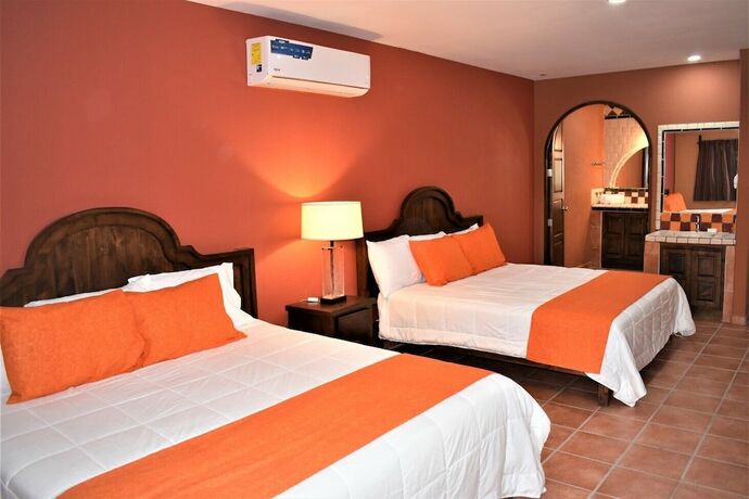 Imagen de la habitación del Hotel HACIENDA MONARCAS RESORT. Foto 19