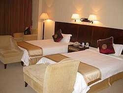 Imagen de la habitación del Hotel HAI YI DA. Foto 3
