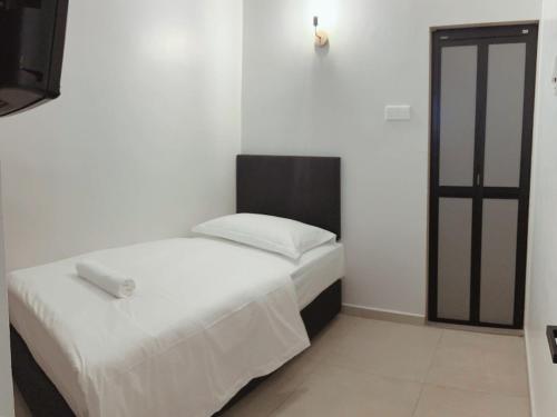 Imagen de la habitación del Hotel HAKO XPRESS TAMPOI. Foto 12