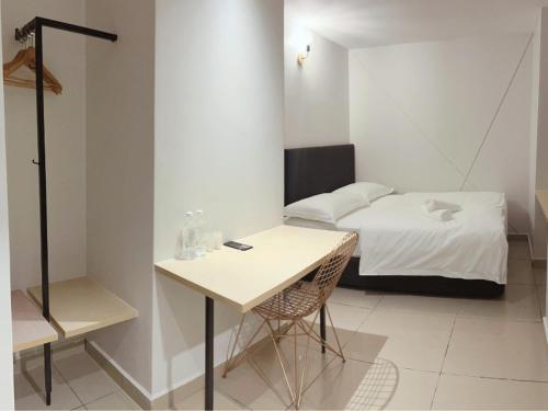 Imagen de la habitación del Hotel HAKO XPRESS TAMPOI. Foto 16