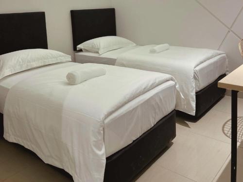 Imagen de la habitación del Hotel HAKO XPRESS TAMPOI. Foto 19