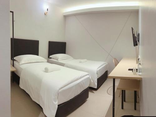 Imagen de la habitación del Hotel HAKO XPRESS TAMPOI. Foto 20