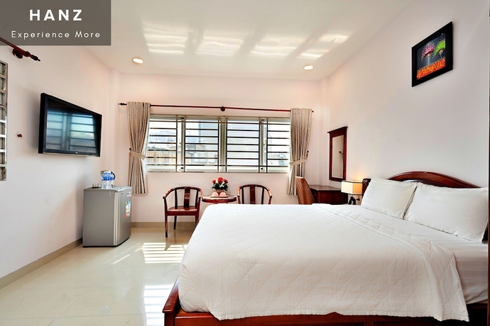 Imagen de la habitación del Hotel HANZ Hoang Hoang near Ben Thanh. Foto 11