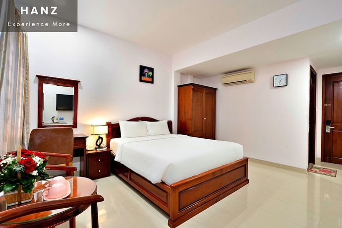 Imagen de la habitación del Hotel HANZ Hoang Hoang near Ben Thanh. Foto 13