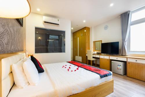 Imagen de la habitación del Hotel HANZ MinhVy. Foto 14