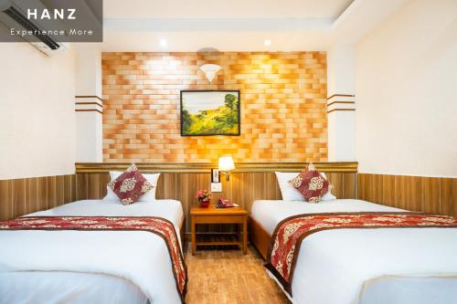 Imagen de la habitación del Hotel HANZ Queen Airport Hotel Tan Binh. Foto 9