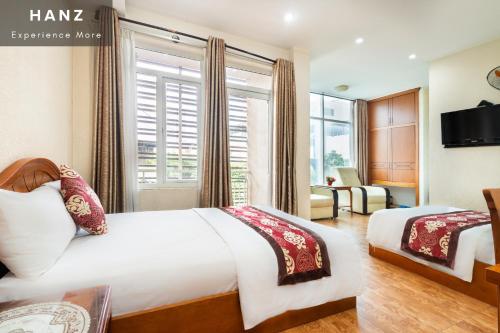 Imagen de la habitación del Hotel HANZ Queen Airport Hotel Tan Binh. Foto 10