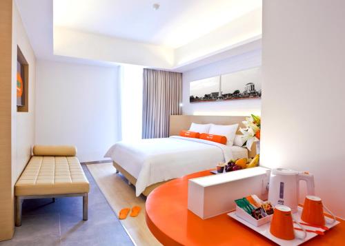 Imagen de la habitación del Hotel HARRIS Hotel Pontianak. Foto 7