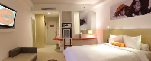 Imagen de la habitación del Hotel HARRIS Hotel Pontianak. Foto 8