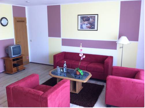 Imagen de la habitación del Hotel HAUS USEDOM Ferienwohnanlage mit Fr&uuml;hst&uuml;cks-Restaurant gegen&uuml;ber im Seeschl&ouml;sschen. Foto 3
