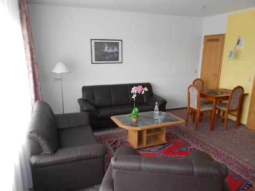 Imagen de la habitación del Hotel HAUS USEDOM Ferienwohnanlage mit Fr&uuml;hst&uuml;cks-Restaurant gegen&uuml;ber im Seeschl&ouml;sschen. Foto 7