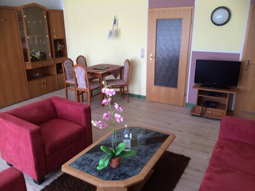 Imagen de la habitación del Hotel HAUS USEDOM Ferienwohnanlage mit Fr&uuml;hst&uuml;cks-Restaurant gegen&uuml;ber im Seeschl&ouml;sschen. Foto 8